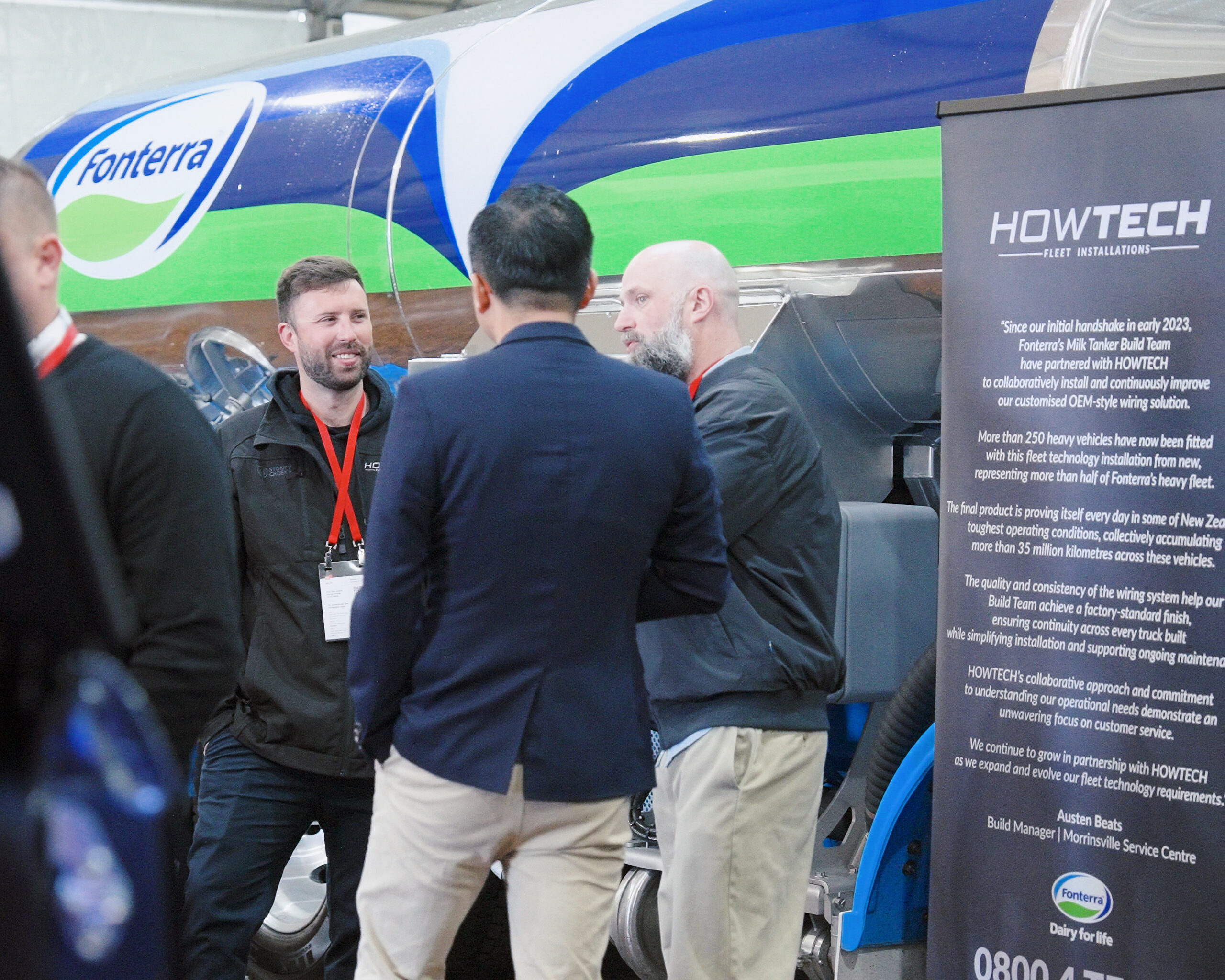 Fleet professionals connecting at EROAD Fleet Days 2026 networking event with Fonterra truck in background
